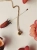 Gold-plated necklace with cognac Baltic amber
