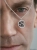 Men’s meteorite pendant necklace worn close to the face