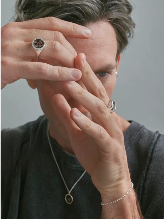 Sterling silver meteorite necklace as a symbolic accent