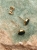 Solid gold stud earrings with deep green nephrite gemstone