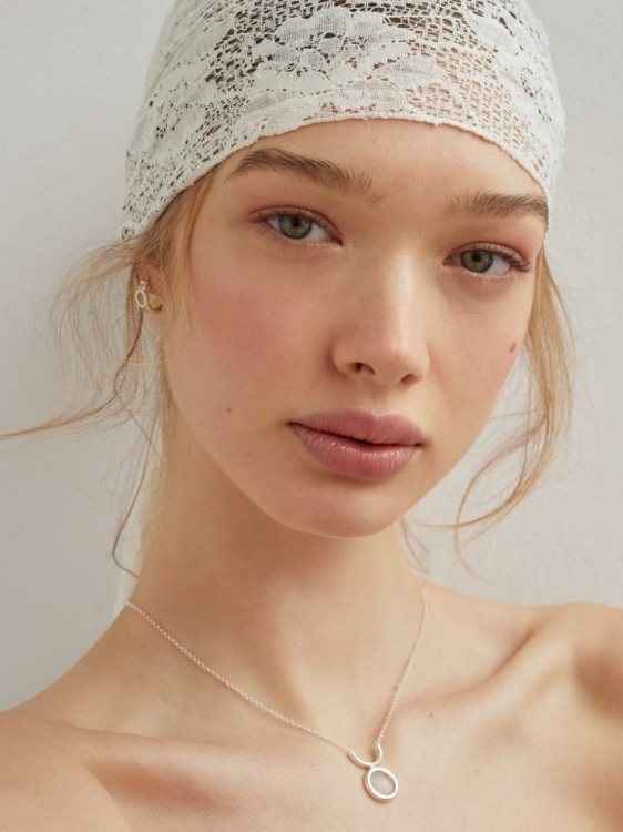 Sterling silver necklace with mountain crystal worn on the neck