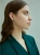 Asymmetrical clip-on earrings with nephrite jade