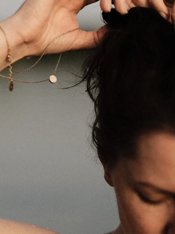 Minimalist gold necklace with white stone