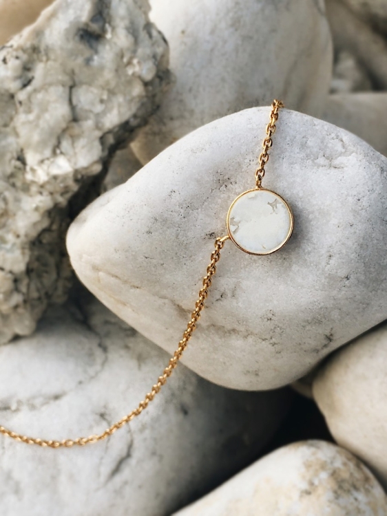 Natural white opal pendant on gold chain