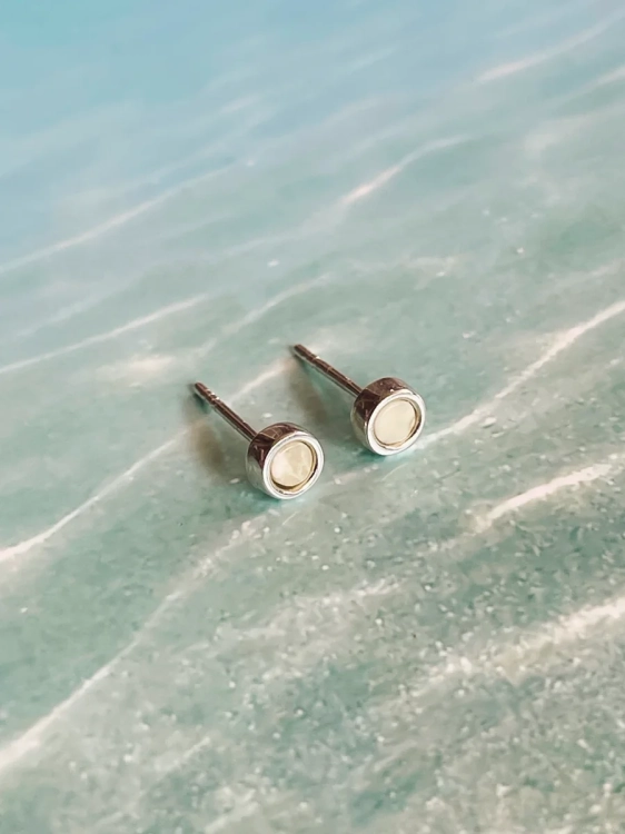 Sterling silver stud earrings with milky amber inspired by nature